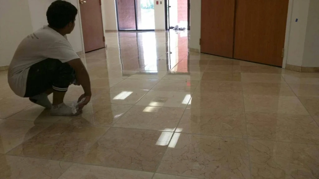 marble doctor louis looking at handy work