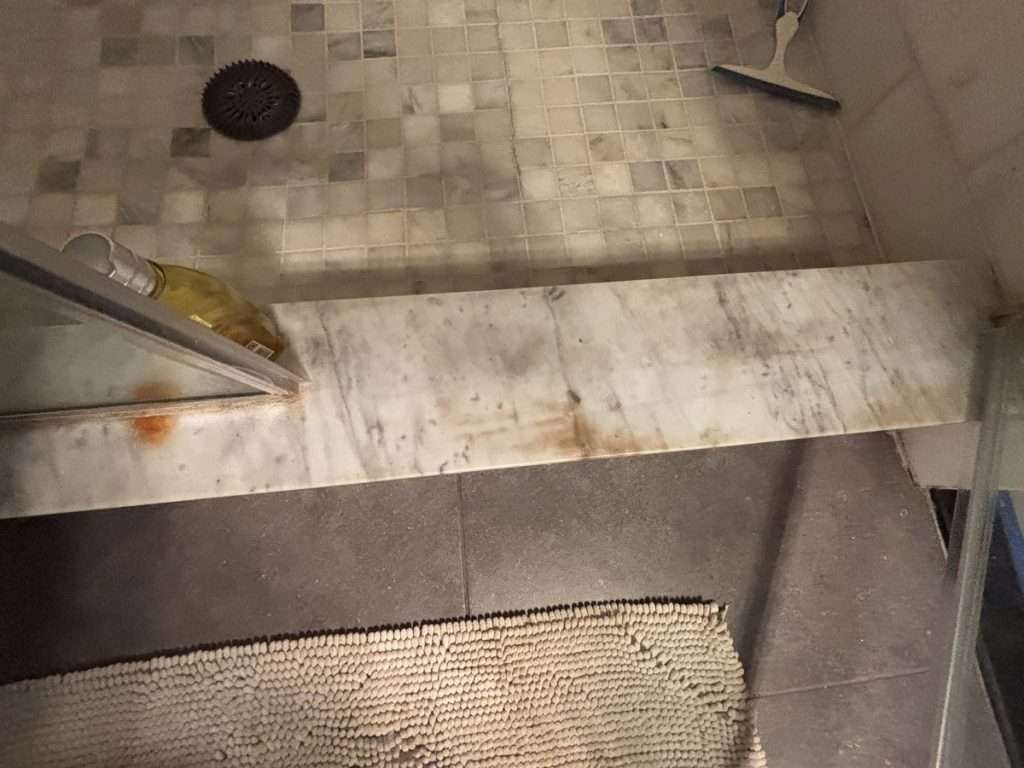 marble shower rust stain
